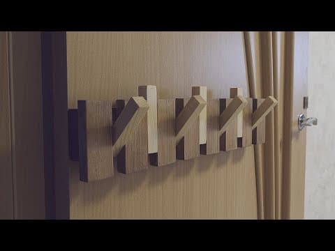 Wooden hanger with hidden hooks